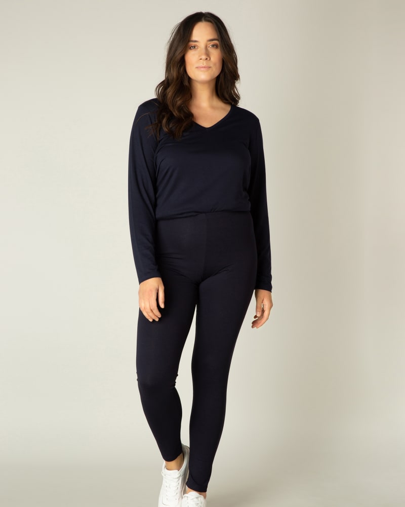Front of a model wearing a size 5(58/60) Andrea in Dark Blue by Base Level Curvy. | dia_product_style_image_id:279736